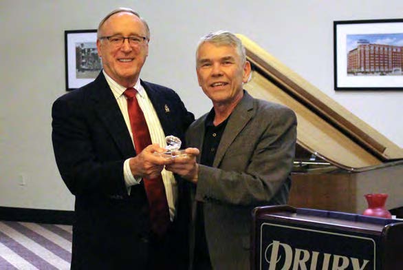 Ron McGuff (l) receiving the “America’s IVC Defender” award from Ron Hunninghake